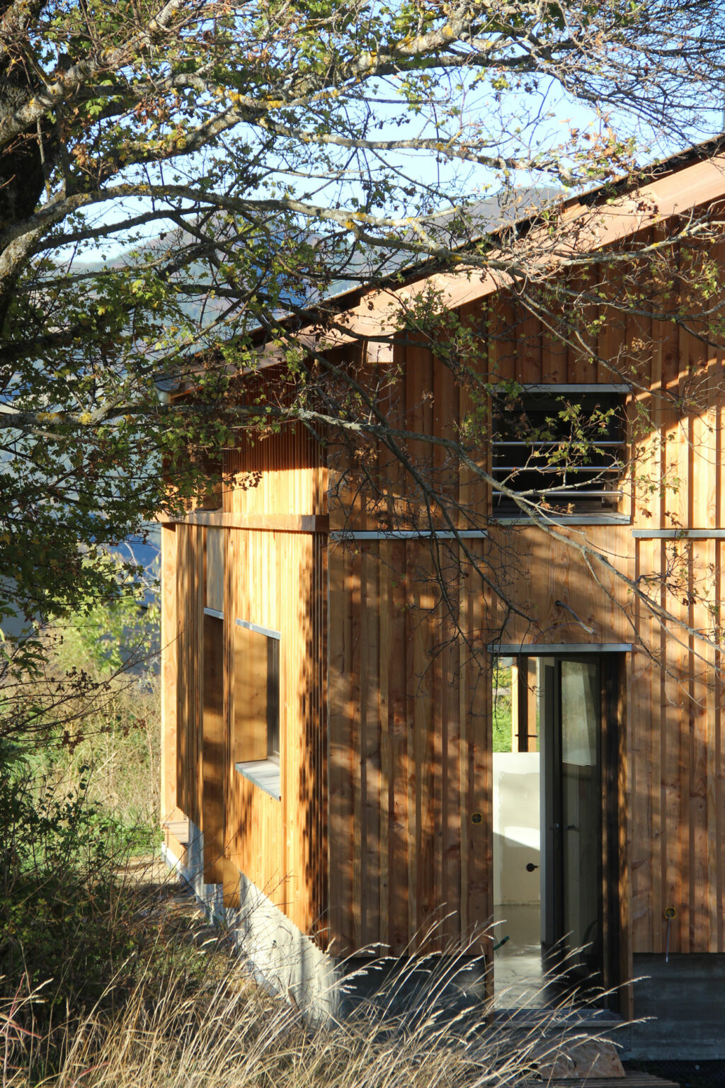 Construction d'une maison en ossature bois et toiture bac acier